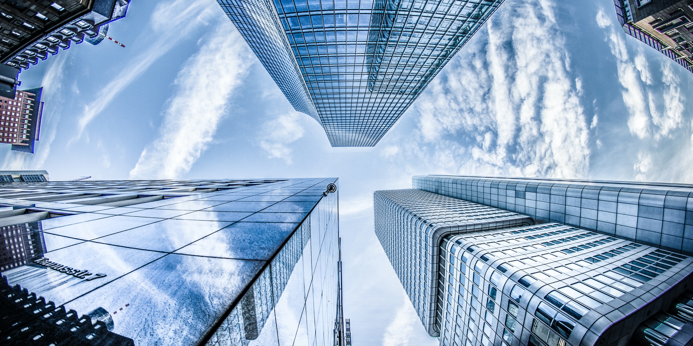 Three Skyscraper Office Buildings with clear blue sky